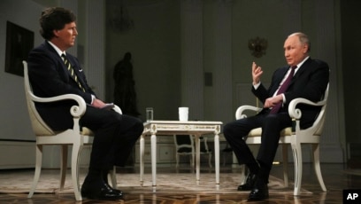 Putinin Karlsona müsahibəsi propaqanda platforması kimi tənqid olunur